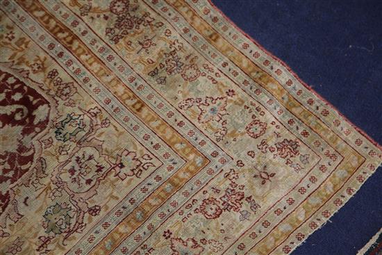 A Qum silk rug, 5ft 3in by 4ft.